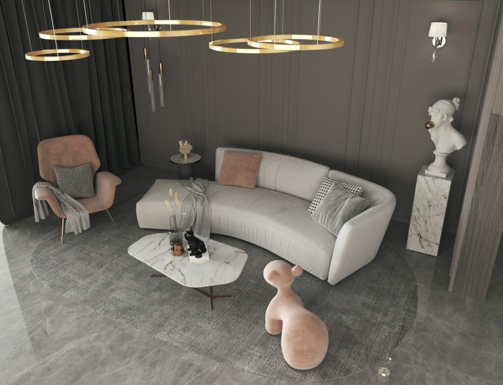 salon minimaliste 2026 avec sofa gris, fauteuil terracotta et luminaires dorés