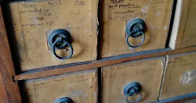 close shot of brown wooden drawer
