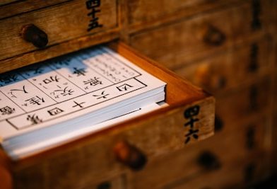 brown wooden framed white and black calendar